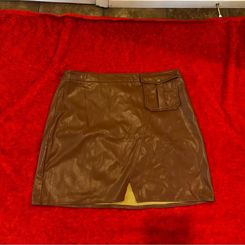 Carmel skirt with a pocket. Very cute with boots and a sweater